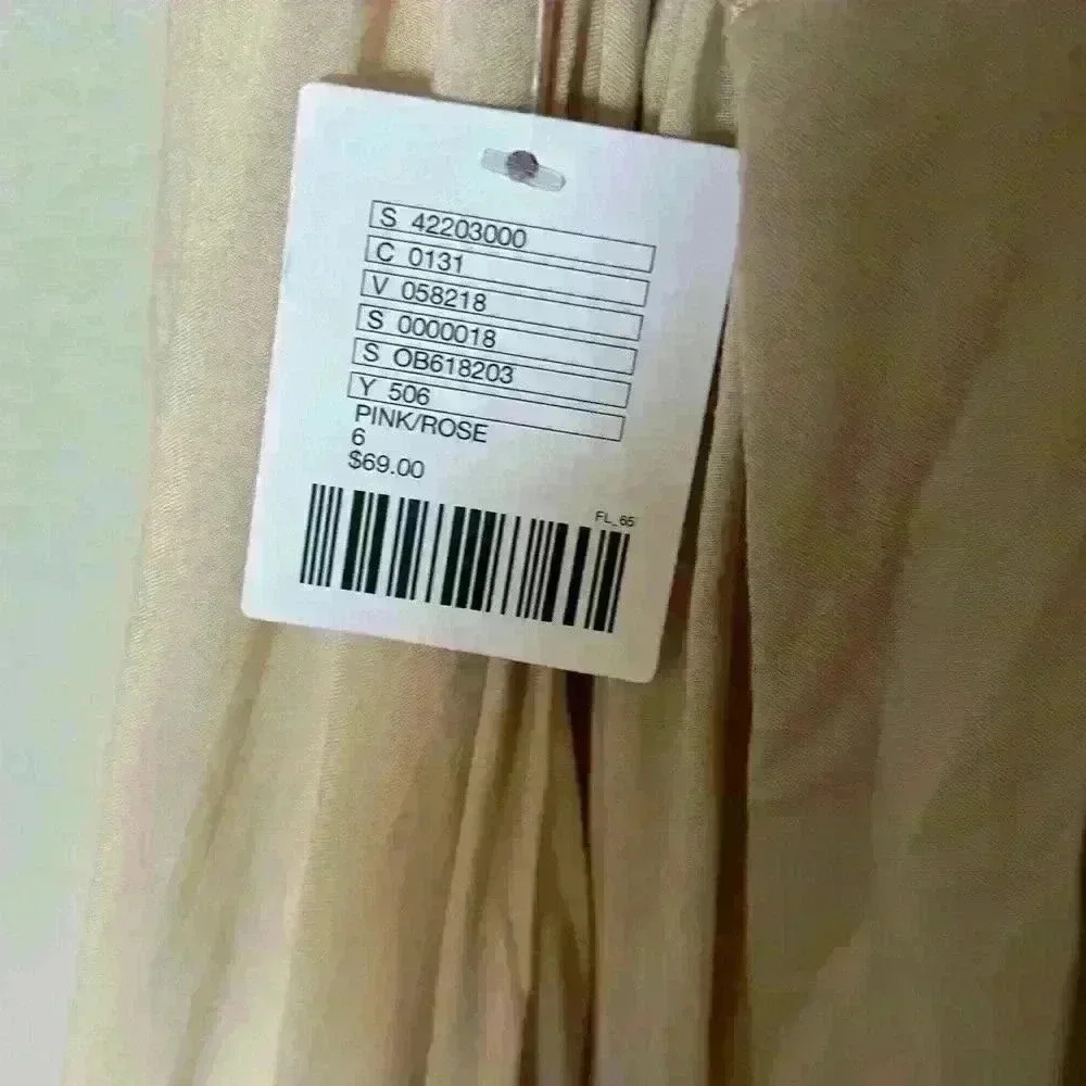 NWT Tan romper with a criss crossed open back - Picture 10 of 16